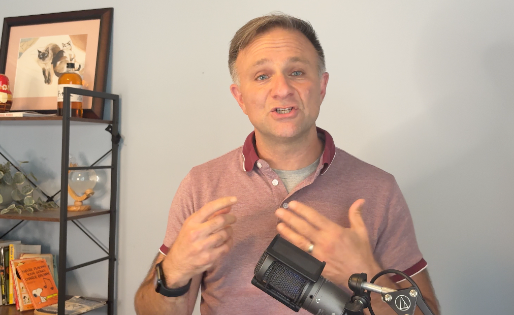 Todd holding his hands up in a T-rex pose